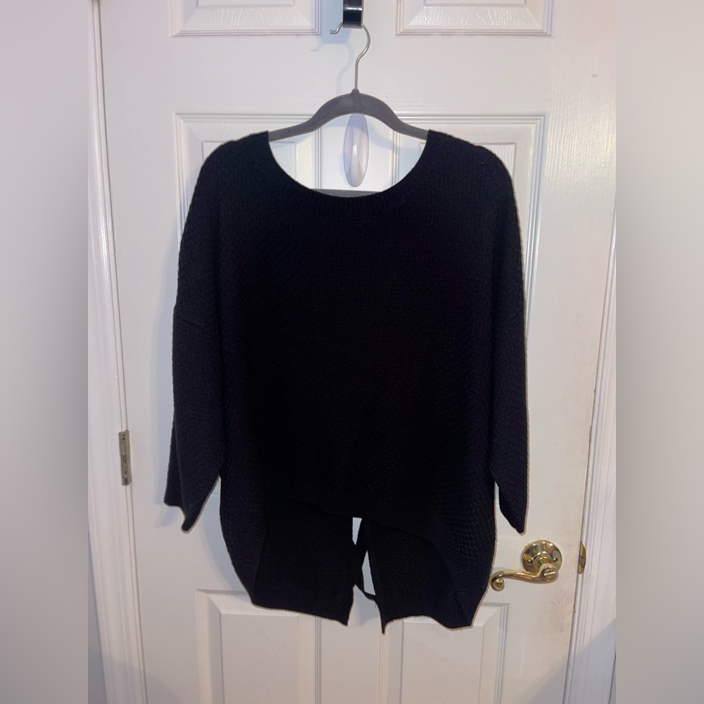 black knitted blouse with tied and open back